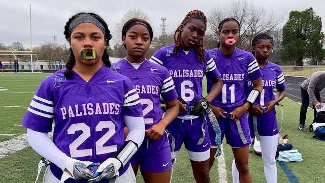  Members of Palisades High School's flag football team lined up looking at camera 
